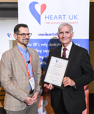 Professor Peter Libby (right) receives the Myant lecture certificate from Professor Handrean Soran
